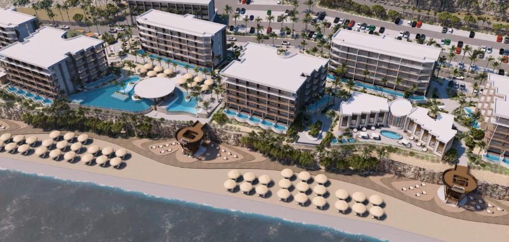 Luchtfoto van TUI BLUE Cura&ccedil;ao met strand en Caribische zee